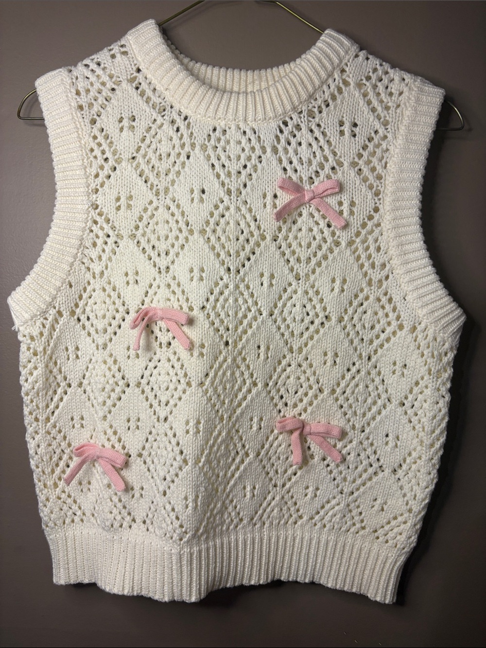 Cream Knit Sleeveless V-Neck Sweater Vest with Pink Bow Accents